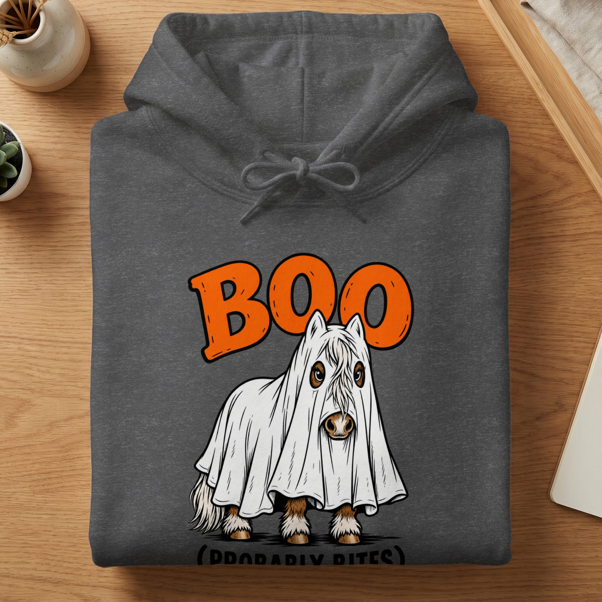 Dark gray hoodie with a graphic of a horse in a ghost costume and the words "BOO (PROBABLY BITES)".
