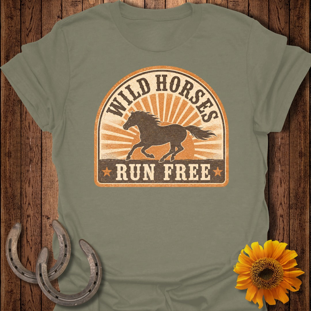 Green t-shirt with "Wild Horses Run Free" graphic and running horse silhouette.