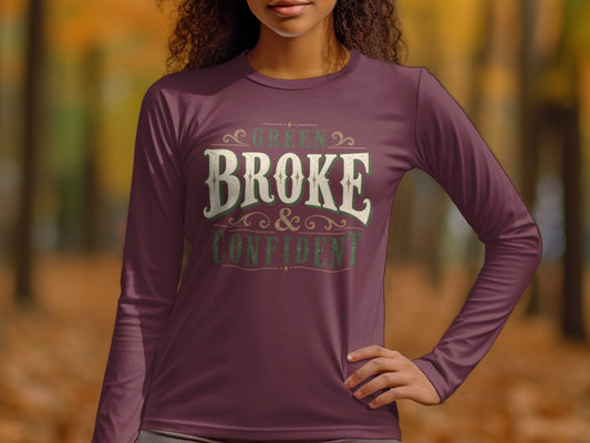 Long sleeve shirt with "Green Broke & Confident" text in distressed font.