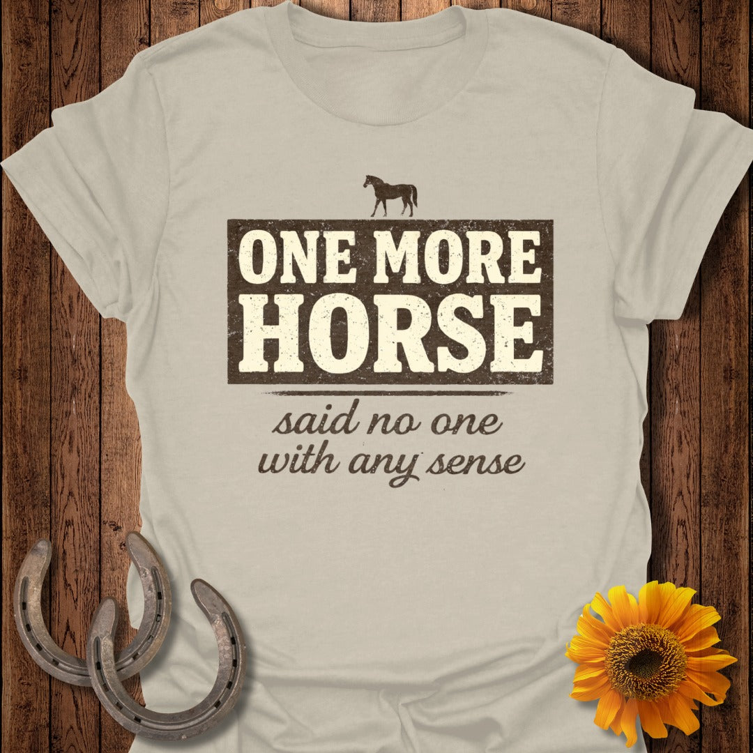 Light beige t-shirt with "ONE MORE HORSE said no one with any sense" text.