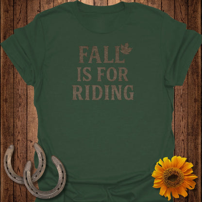 Green t-shirt with "FALL IS FOR RIDING" text, horseshoes, and sunflower.