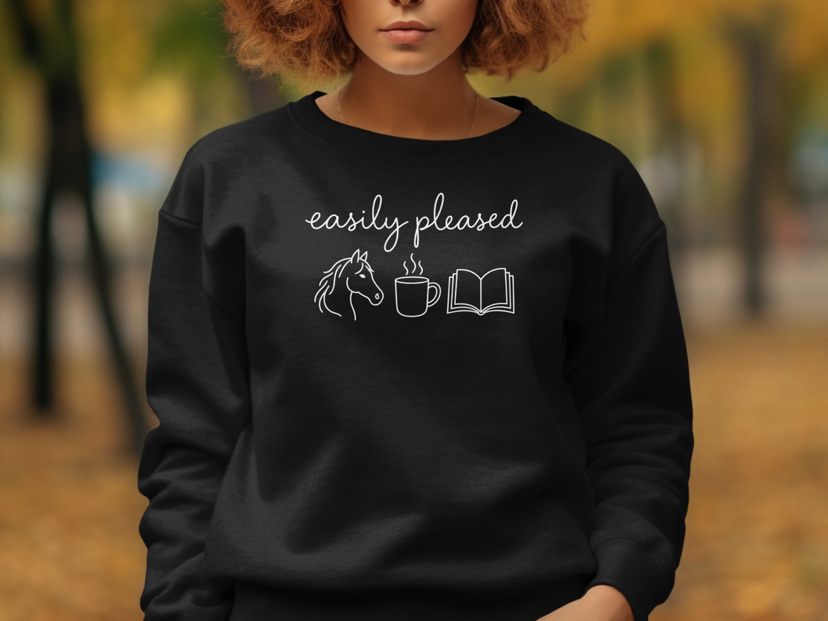 Black sweatshirt with white graphic of a horse, coffee cup, and open book.