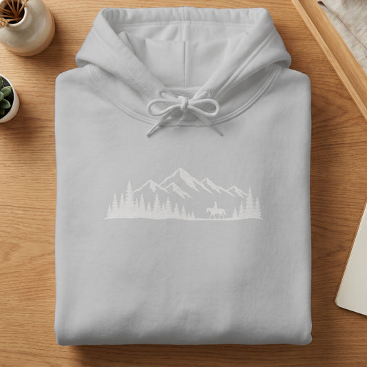 Gray hoodie with white mountain, forest, and equestrian graphic design.