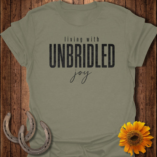 Olive green t-shirt with "living with UNBRIDLED joy" text.
