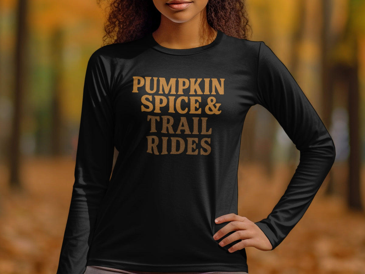 Black long sleeve shirt with "Pumpkin Spice & Trail Rides" text in gold.