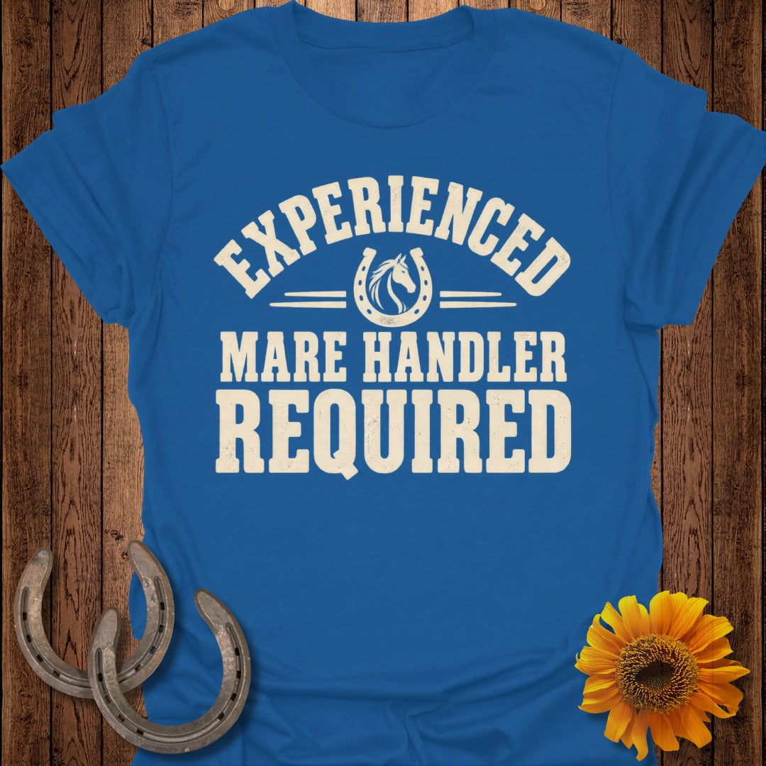 Royal blue t-shirt with "Experienced Mare Handler Required" text and horseshoe graphic.