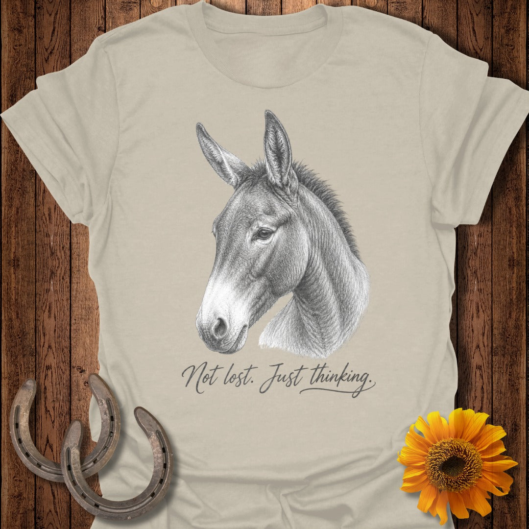 T-shirt with donkey head sketch and text "Not lost. Just thinking."