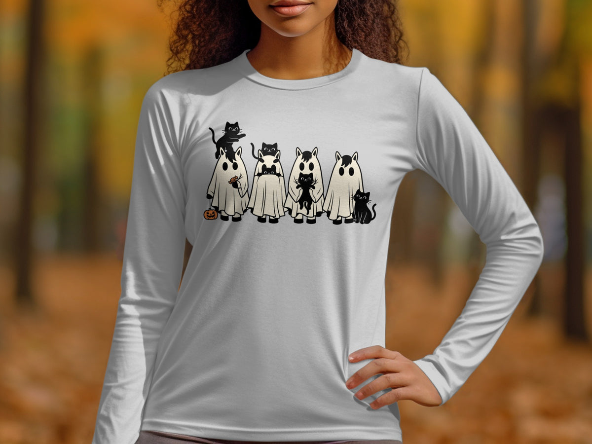 White long-sleeve shirt featuring cartoon ghosts and black cats.