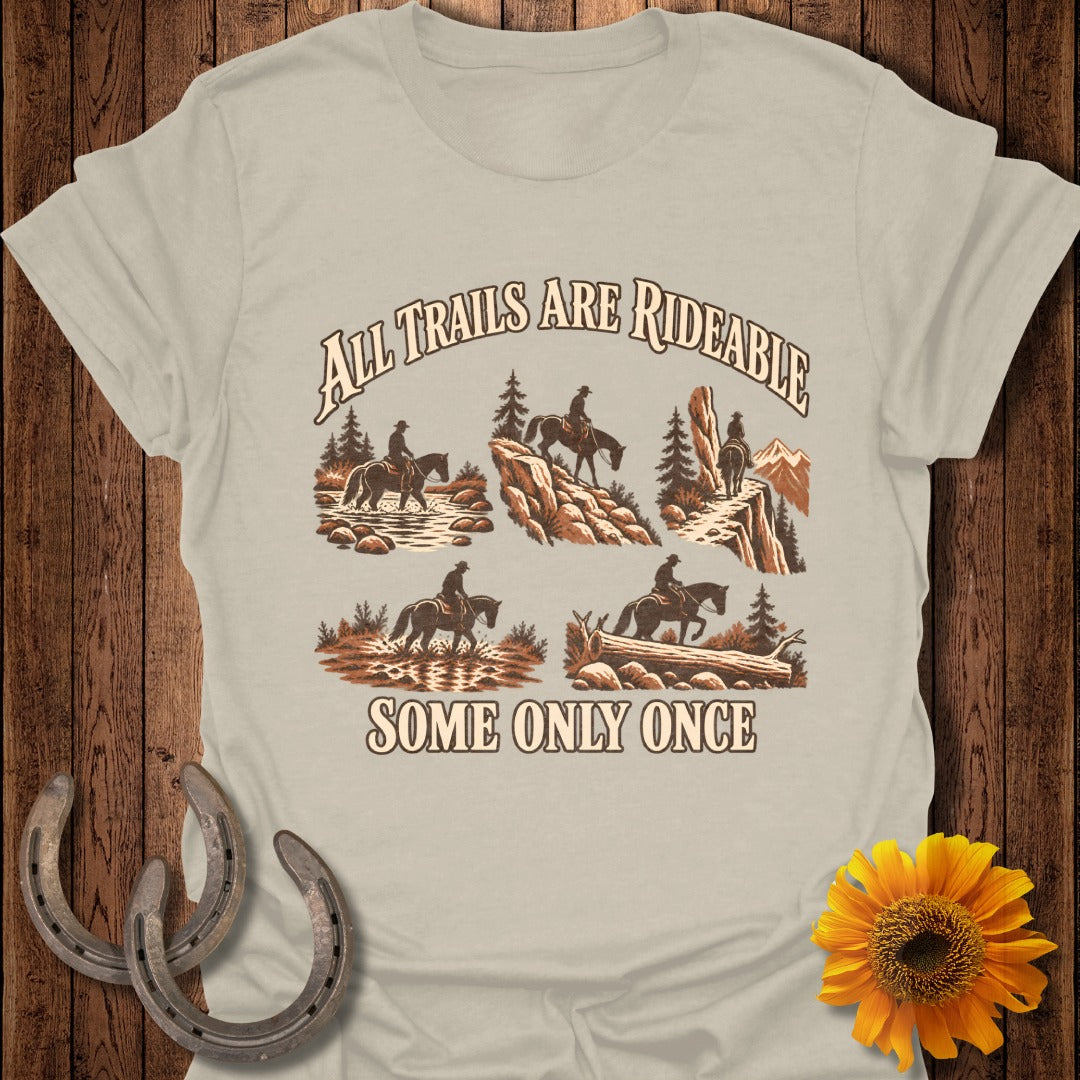 Graphic of horseback riders on various terrain with text "All Trails Are Rideable Some Only Once".