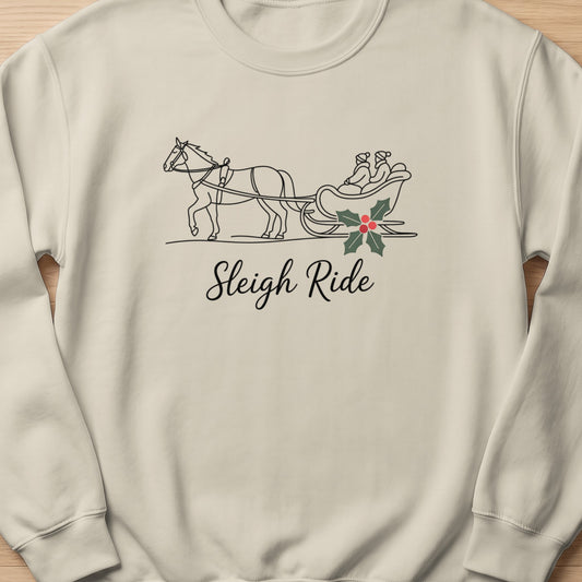 Crewneck sweatshirt with line drawing of horse-drawn sleigh and "Sleigh Ride" text.