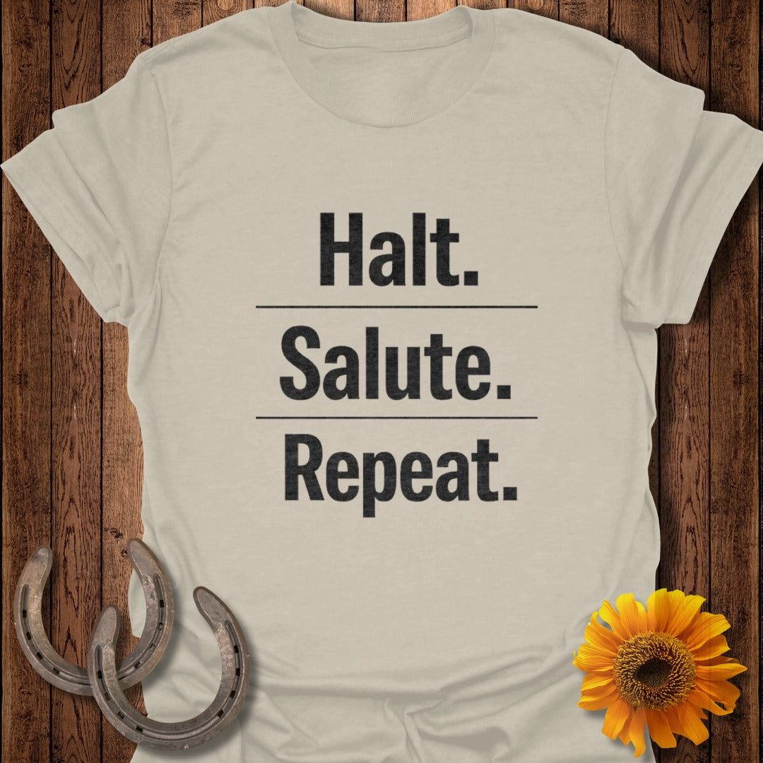 Tan t-shirt with black text Halt. Salute. Repeat. and two horseshoes.