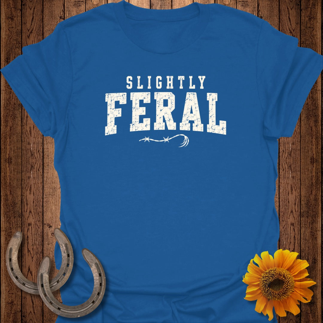Blue t-shirt with "Slightly Feral" text, barbed wire, horseshoes, and sunflower.