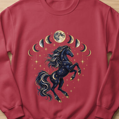 Dark horse with celestial moon phases and stars design on a maroon sweatshirt.